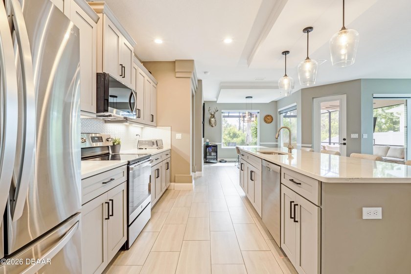 Discover a spacious contemporary home perfectly zoned for the - photo 10