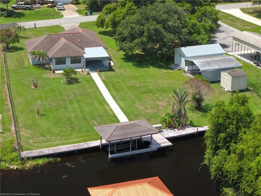 WATERFRONT HOME on almost 1/2 acre. Dock with boathouse and lift - photo 3