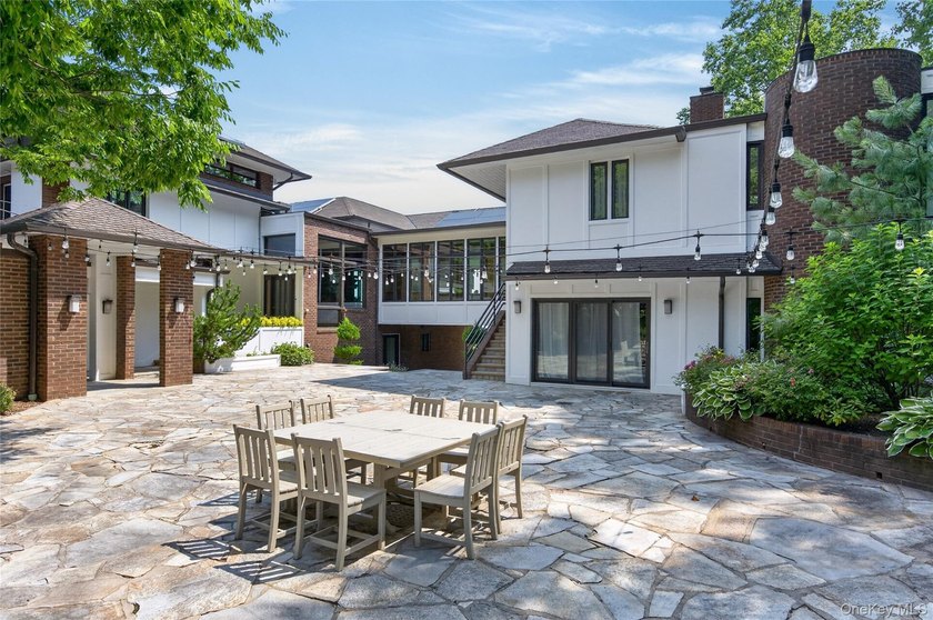 Perched above Oyster Bay Harbor on 4.04 private acres in the - photo 3