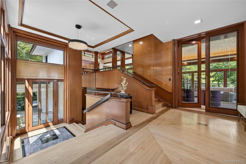 Perched above Oyster Bay Harbor on 4.04 private acres in the - photo 5