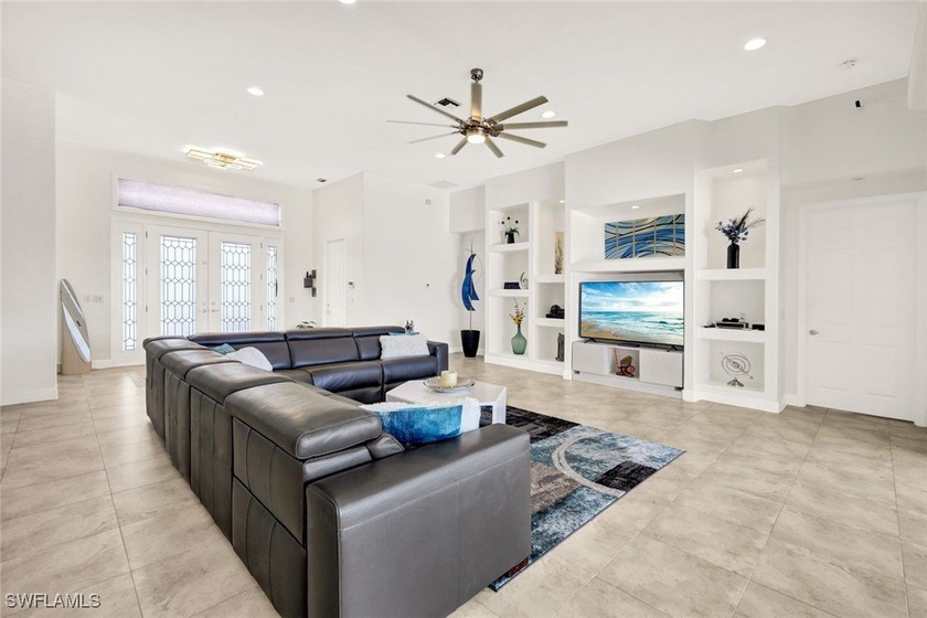 Unique custom waterfront home on a a 100 feet wide canal and - photo 4