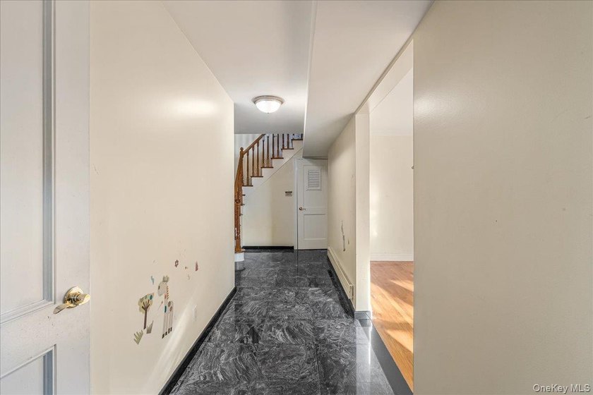 Welcome to Charming Two-Family Home in Prime Oakland Gardens, a - photo 4