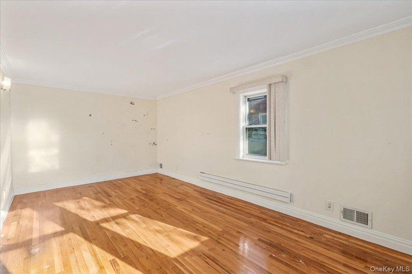 Welcome to Charming Two-Family Home in Prime Oakland Gardens, a - photo 5
