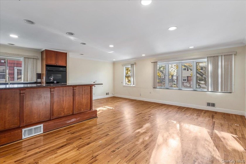 Welcome to Charming Two-Family Home in Prime Oakland Gardens, a - photo 8