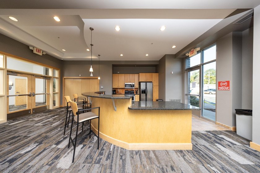 This beautiful condo is a standout with its soaring 16-foot - photo 12