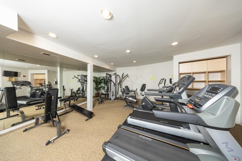This beautiful condo is a standout with its soaring 16-foot - photo 13