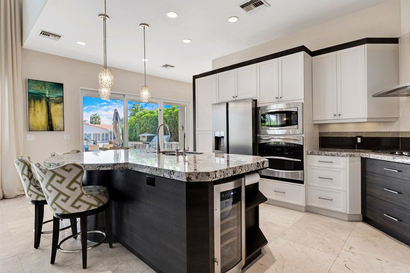 Experience a luxury waterfront estate in Pompano Beach featuring - photo 9