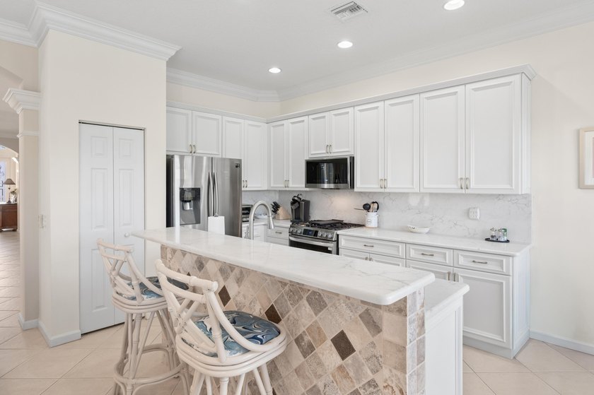 Welcome to this single-story waterfront residence in the - photo 12