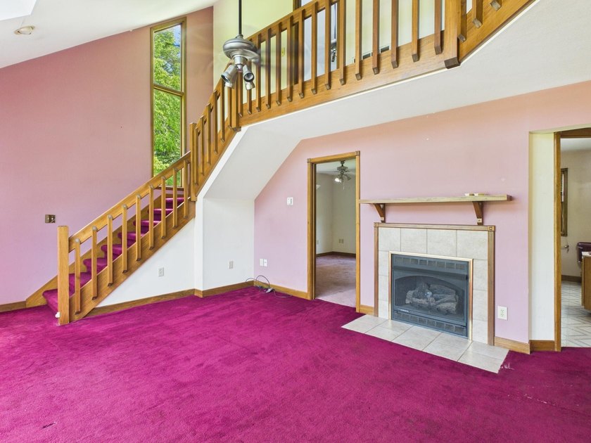 Unlock the potential of this charming lakefront fixer-upper on - photo 16