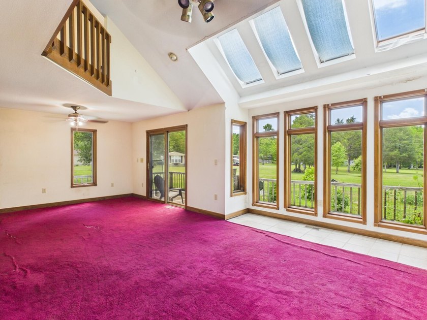 Unlock the potential of this charming lakefront fixer-upper on - photo 17