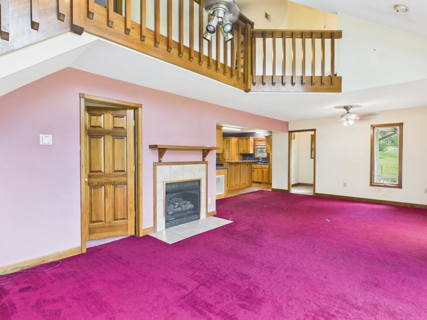 Unlock the potential of this charming lakefront fixer-upper on - photo 19