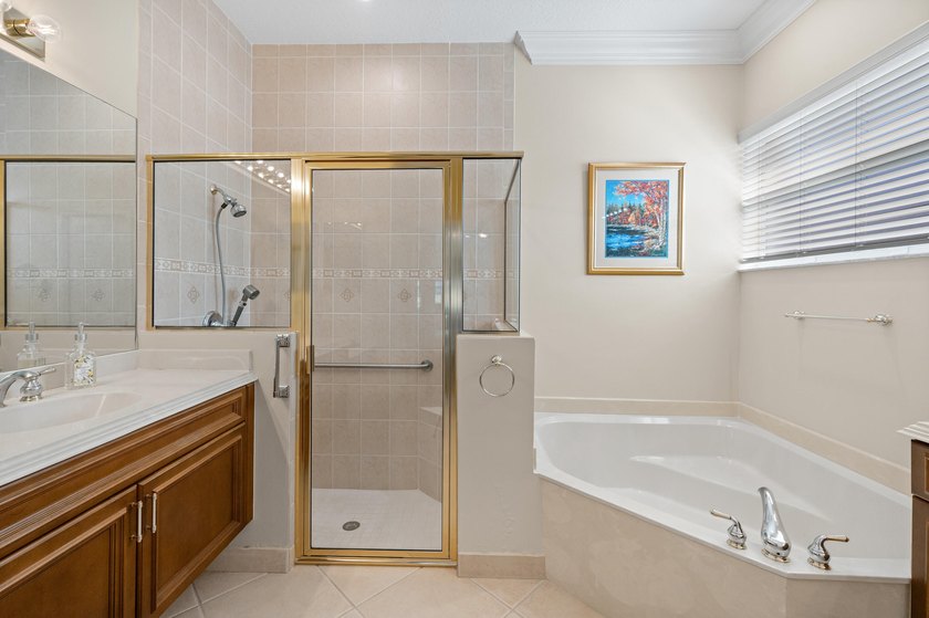 Welcome to this single-story waterfront residence in the - photo 23