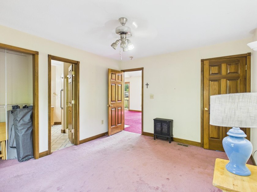Unlock the potential of this charming lakefront fixer-upper on - photo 27