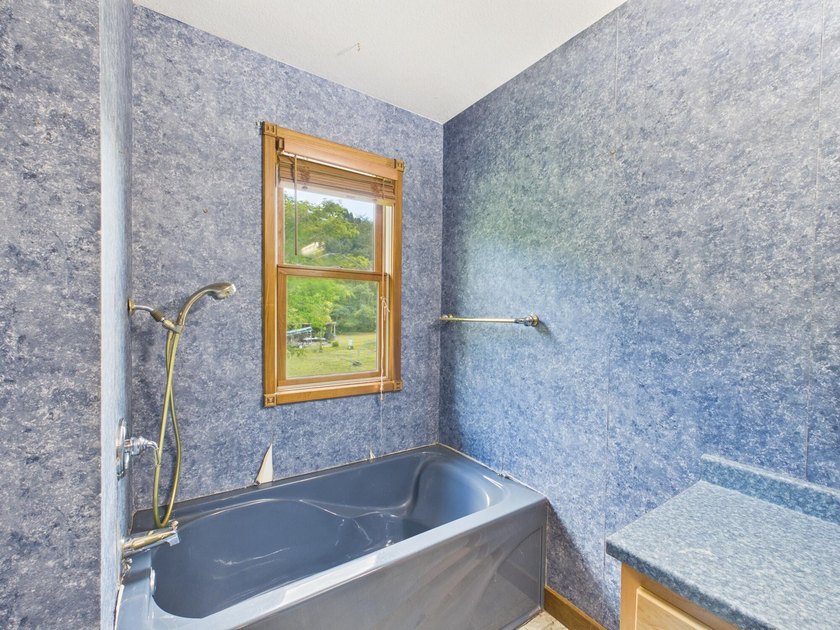 Unlock the potential of this charming lakefront fixer-upper on - photo 36