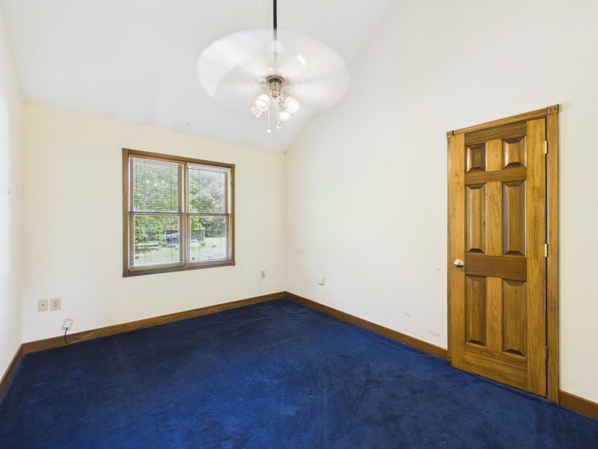 Unlock the potential of this charming lakefront fixer-upper on - photo 41