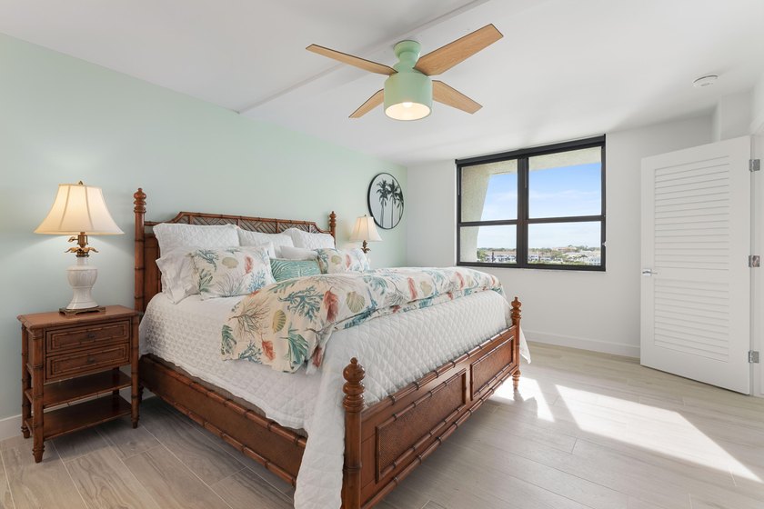 Experience elevated coastal living in this immaculate, fully - photo 27