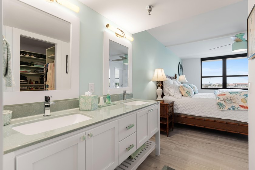 Experience elevated coastal living in this immaculate, fully - photo 28