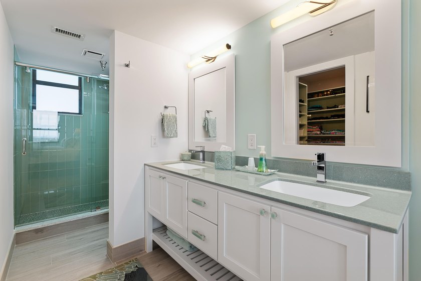 Experience elevated coastal living in this immaculate, fully - photo 31