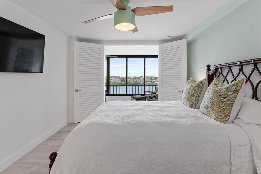 Experience elevated coastal living in this immaculate, fully - photo 42