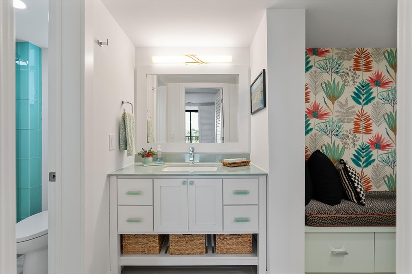 Experience elevated coastal living in this immaculate, fully - photo 45