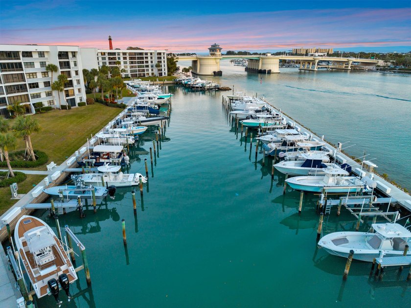 Experience elevated coastal living in this immaculate, fully - photo 49