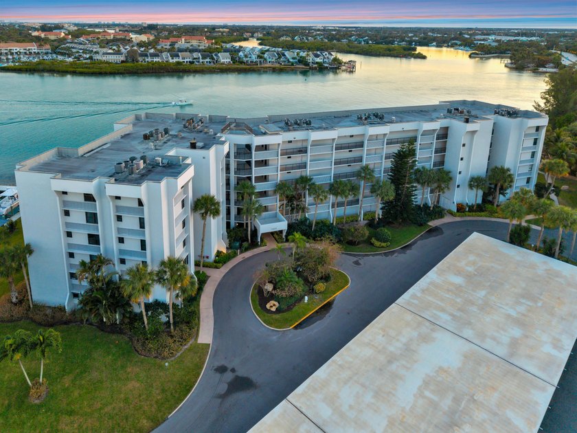 Experience elevated coastal living in this immaculate, fully - photo 50