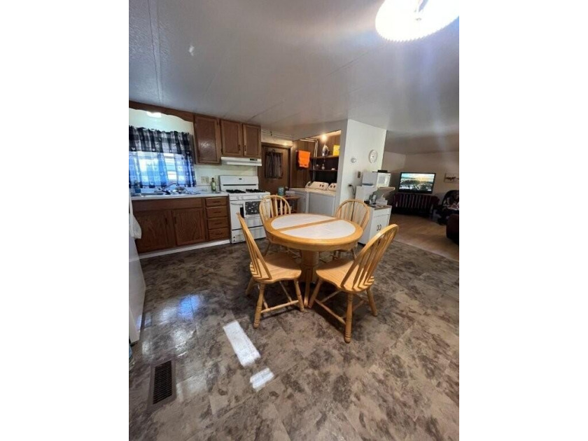 Affordable and move-in ready, this well-maintained 2-bedroom, 1 - photo 5