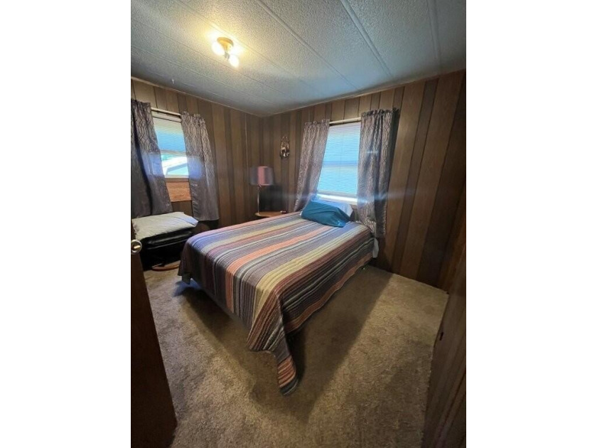 Affordable and move-in ready, this well-maintained 2-bedroom, 1 - photo 10