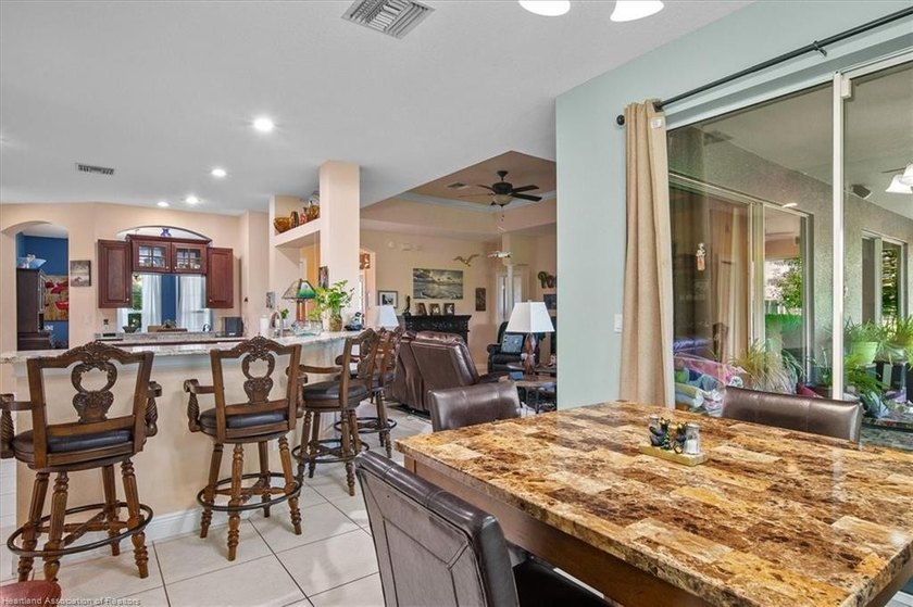 BEAUTIFUL GOLF COURSE HOME in The Country Club of Sebring. This - photo 8