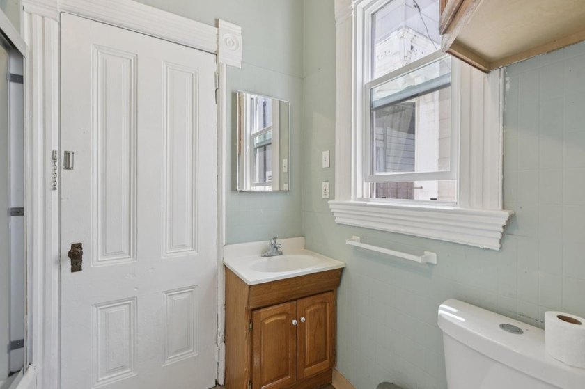 Classic 1897 Victorian in the Heart of West Oakland! Filled with - photo 14
