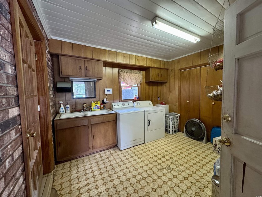 Lovely brick ranch-style home with just over 12 acres! Through - photo 3