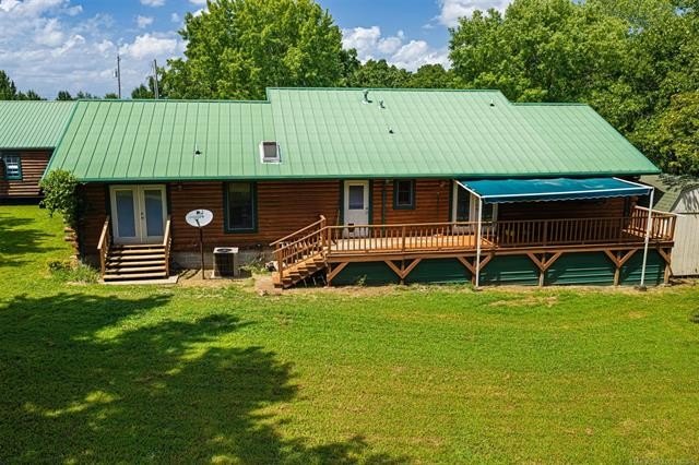 Nestled on just over 2 beautiful acres this custom-built log - photo 6