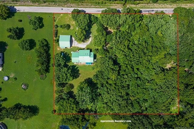 Nestled on just over 2 beautiful acres this custom-built log - photo 9
