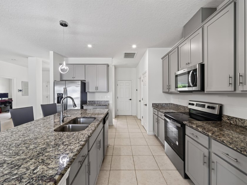 Practically perfect POOL home just in time for summer! Rare - photo 10