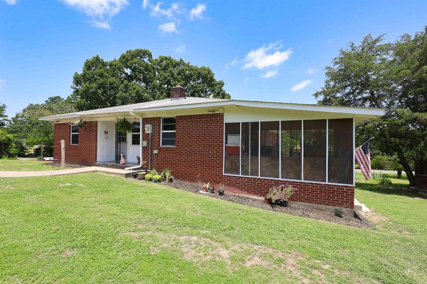 Classic brick home with room to spread out! Situated on - photo 4