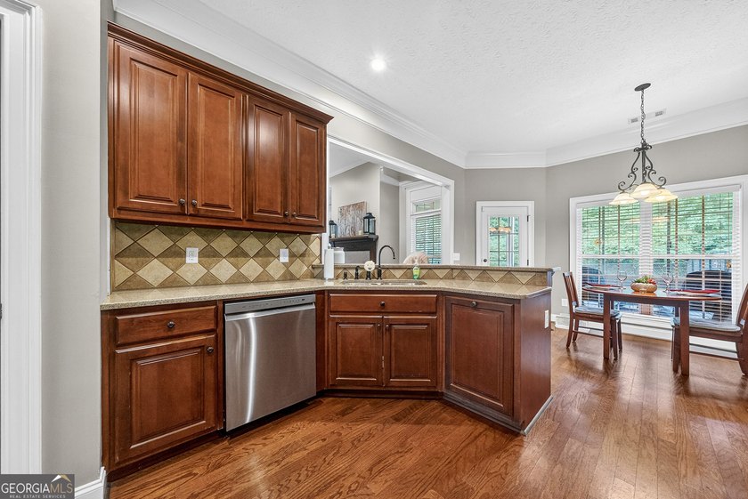 Welcome home to this beautifully maintained all-brick ranch - photo 13