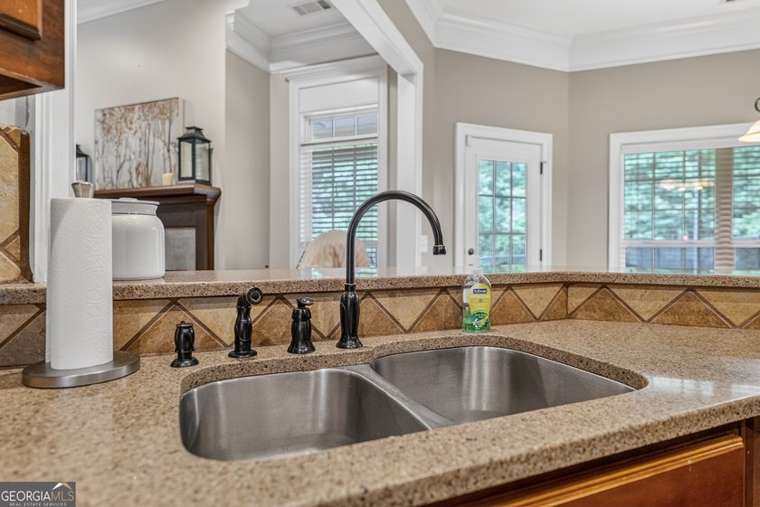 Welcome home to this beautifully maintained all-brick ranch - photo 17