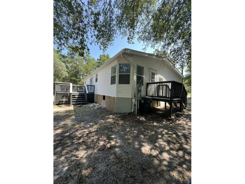 Welcome to this charming home featuring 3 bedrooms and 2 full - photo 21