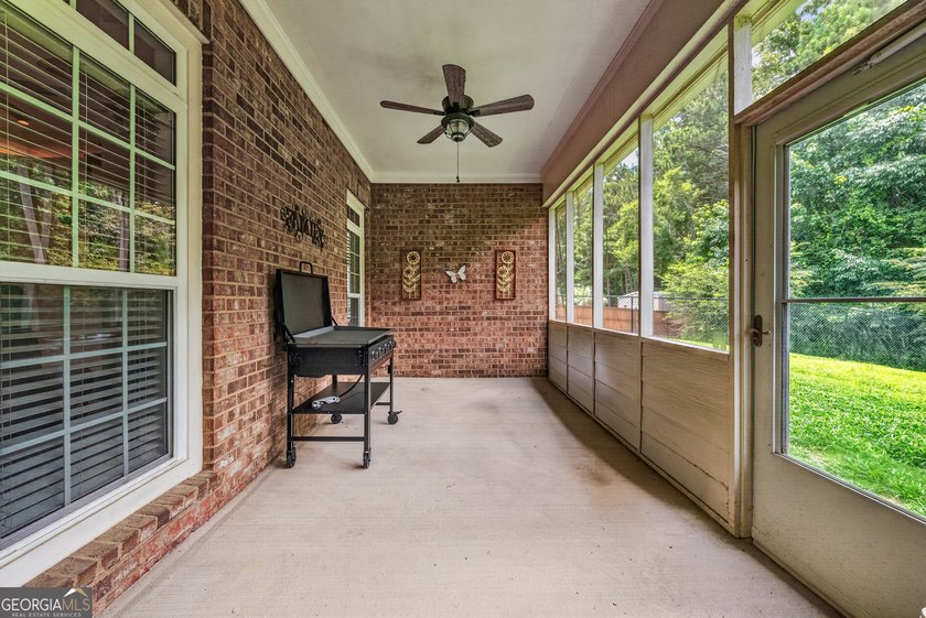Welcome home to this beautifully maintained all-brick ranch - photo 32