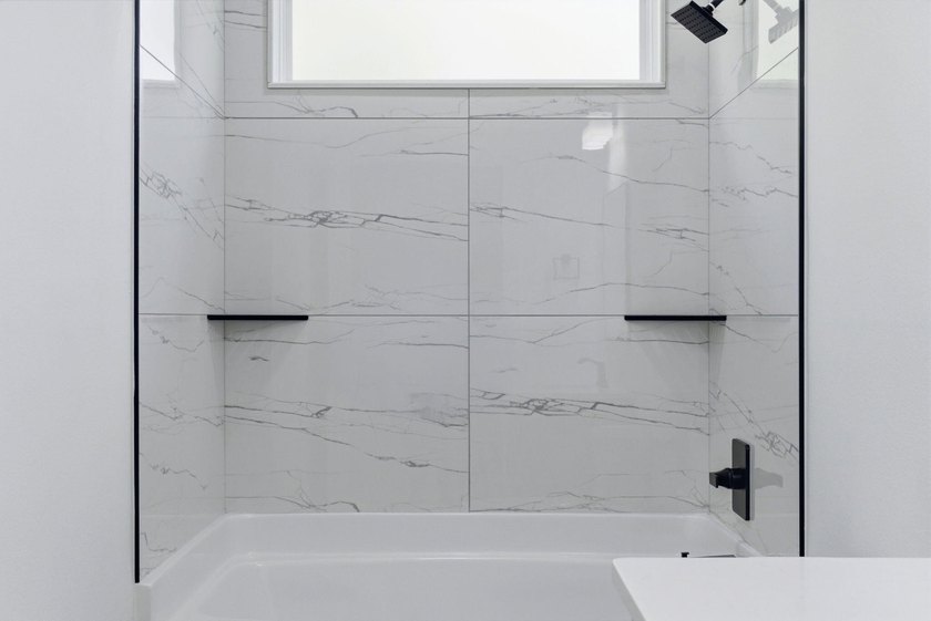 This remarkable new construction home by Carr Custom Homes is - photo 34
