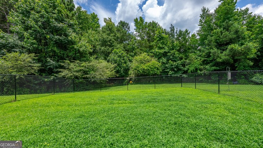 Welcome home to this beautifully maintained all-brick ranch - photo 39
