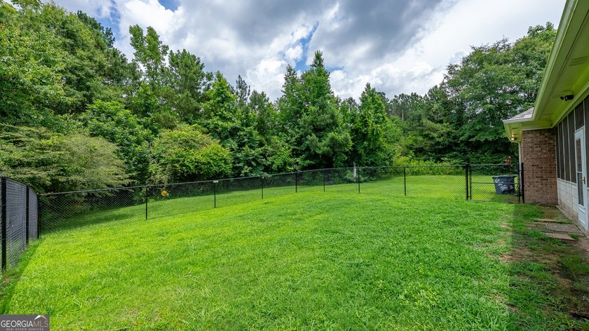 Welcome home to this beautifully maintained all-brick ranch - photo 40