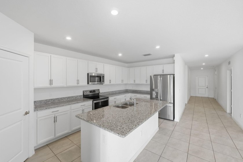 4 BEDROOMS | 3 BATHROOMS | PRIVATE GUEST APARTMENT | NO HOA | - photo 10