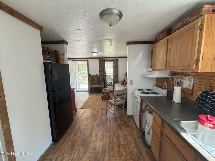 This 81+/- acre recreational tract in Holmes County offers the - photo 2