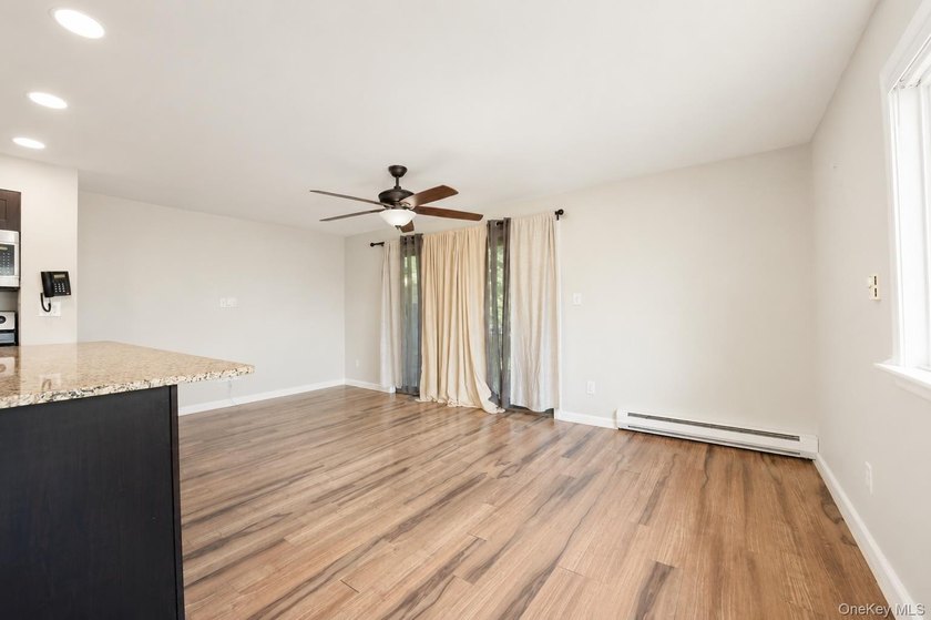 Experience resort-style living in this beautifully updated - photo 4