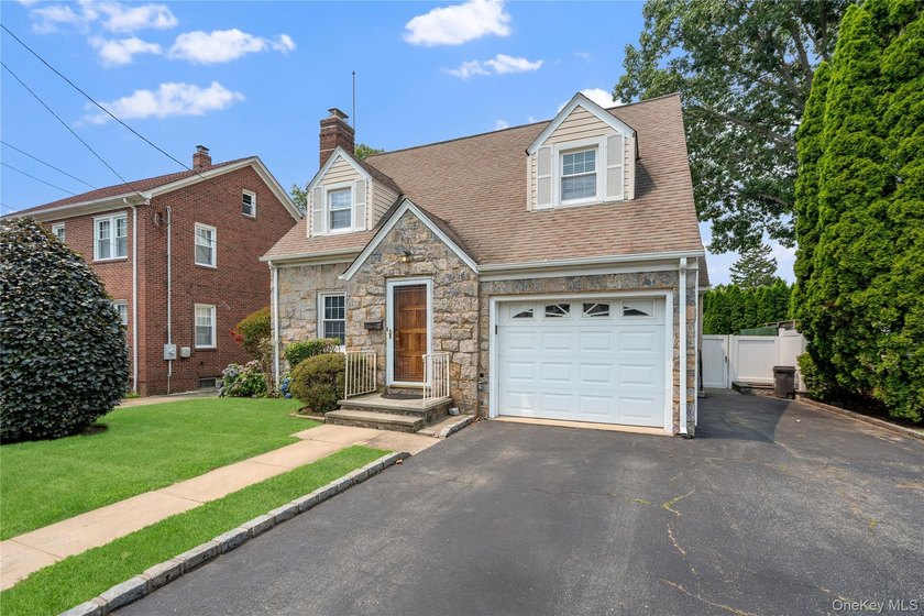 Welcome to this beautifully maintained expanded Cape where - photo 2