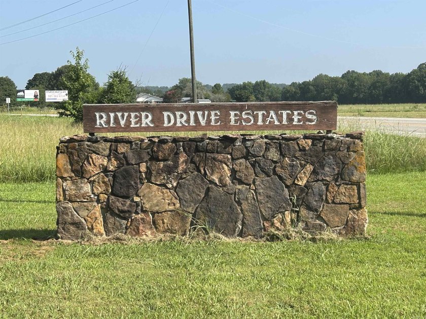 WOW! If you love fishing and riverfront living, this home is for - photo 4