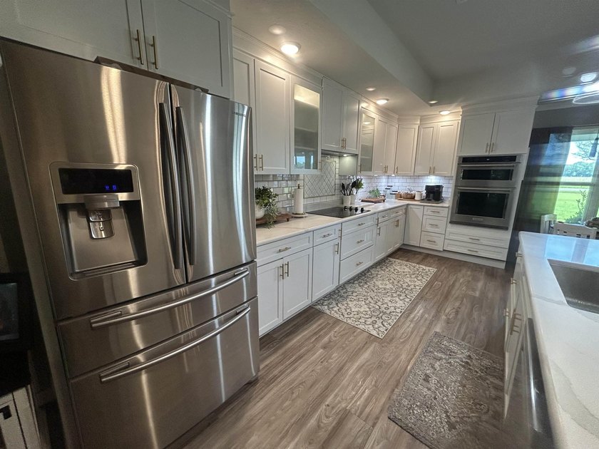 WOW! If you love fishing and riverfront living, this home is for - photo 9