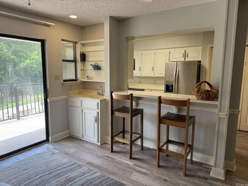 Enjoy the privacy of this upper-level condo with no steps - photo 7