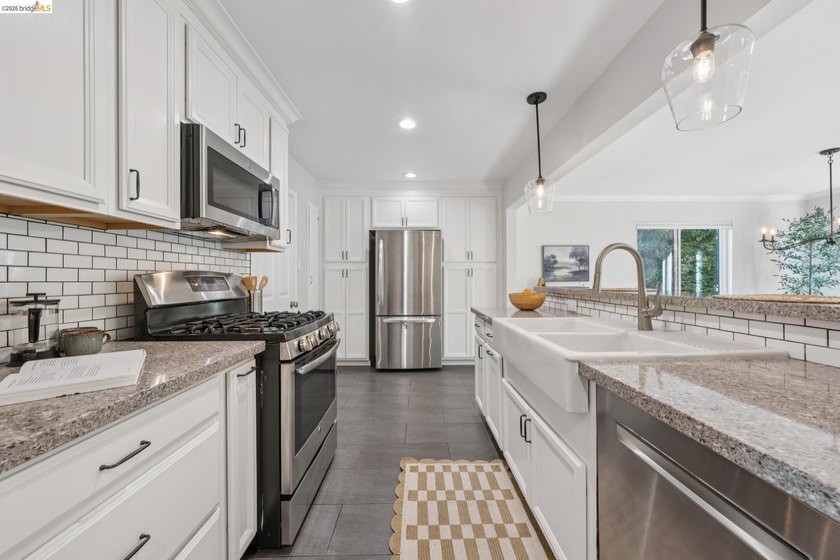 Thoughtfully updated throughout, this single-level home offers a - photo 17
